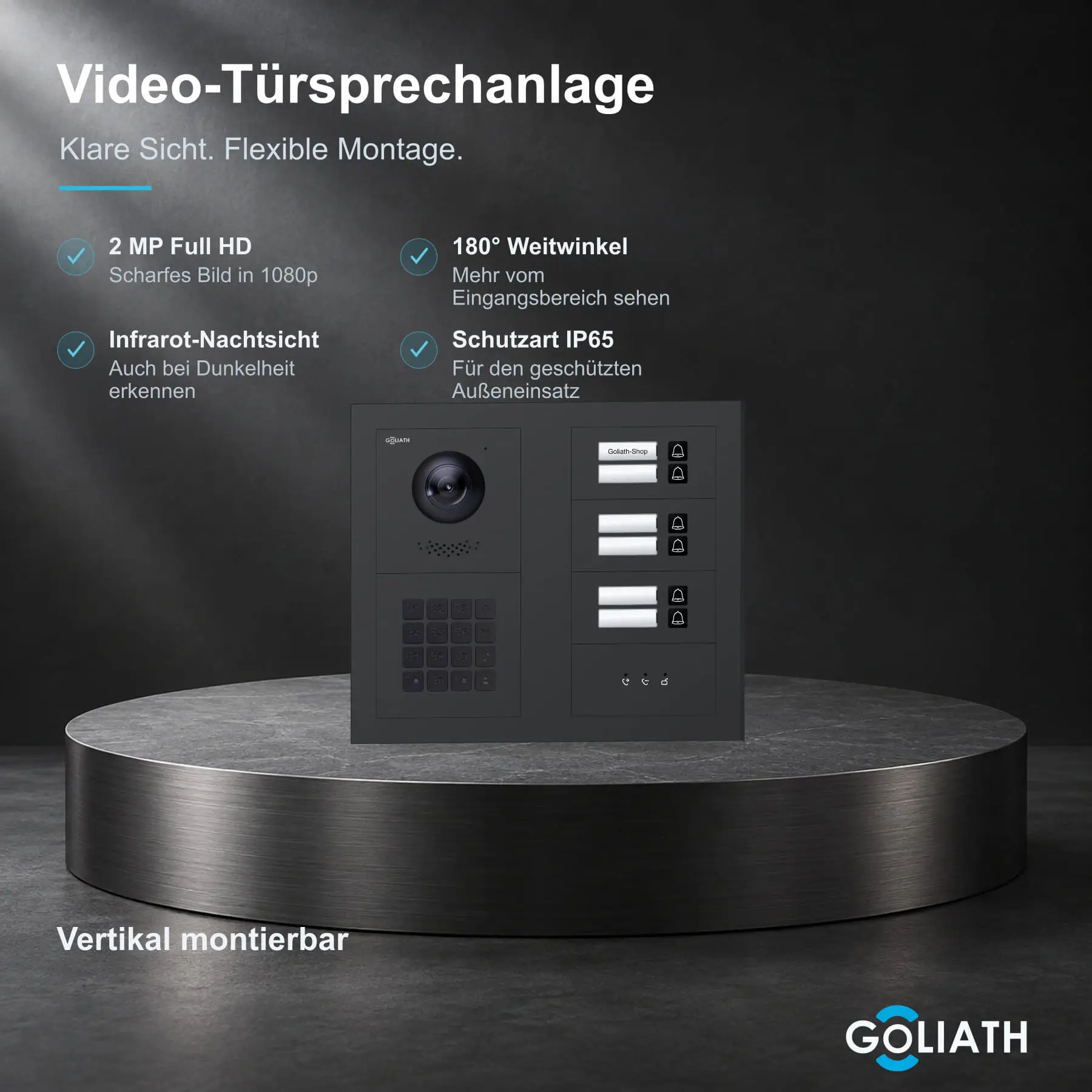 Goliath Premium-Line-Außenstation in Anthrazit mit Kamera, 6 Klingeltasten, Zahlencode-Tastatur und Feedback-Anzeige. Zwei aufrechte Modulspalten nebeneinander auf Naturstein.