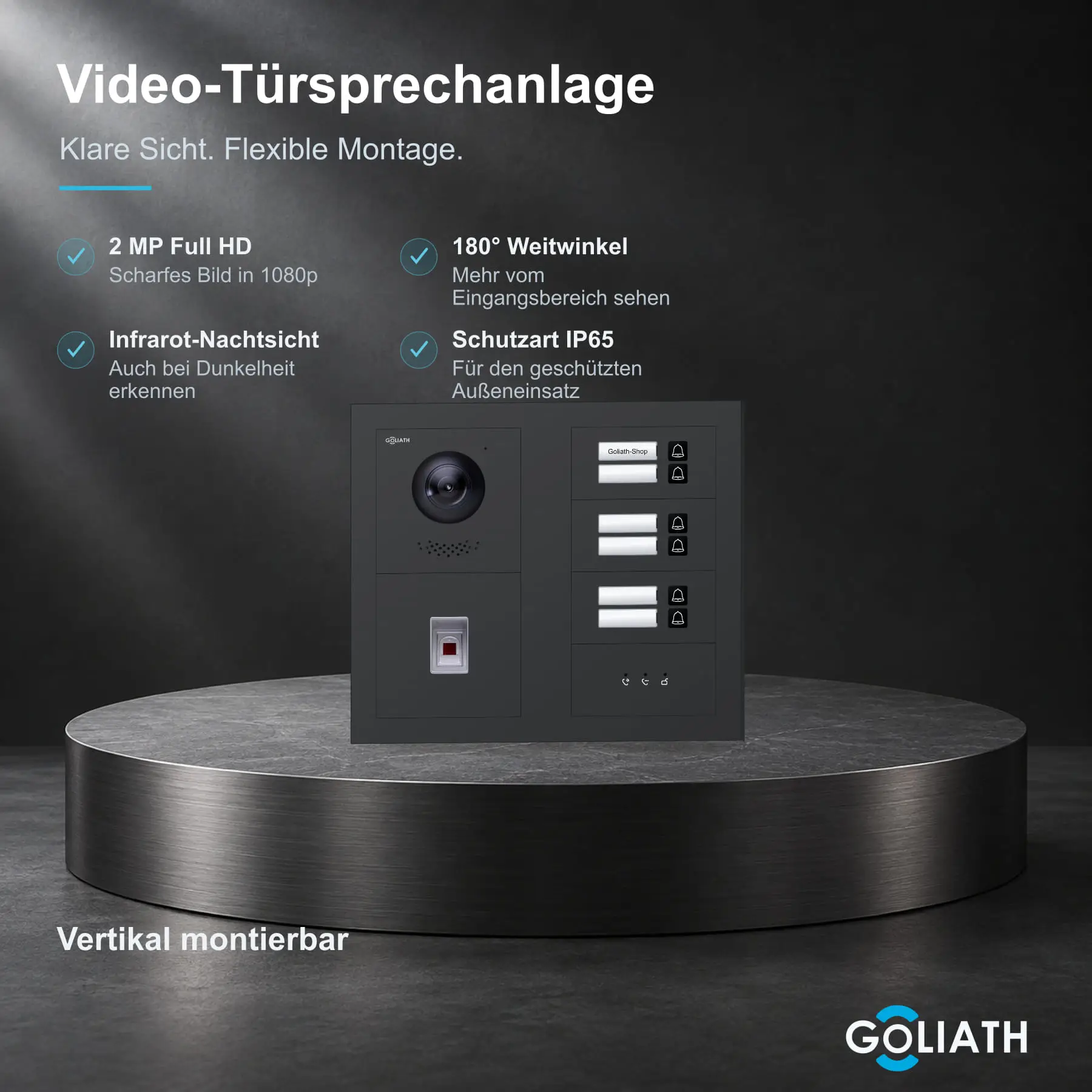 Goliath Premium-Line-Außenstation in Anthrazit mit Kamera, 6 Klingeltasten, Fingerprint-Modul und Feedback-Anzeige. Zwei aufrechte Modulspalten nebeneinander auf Naturstein.