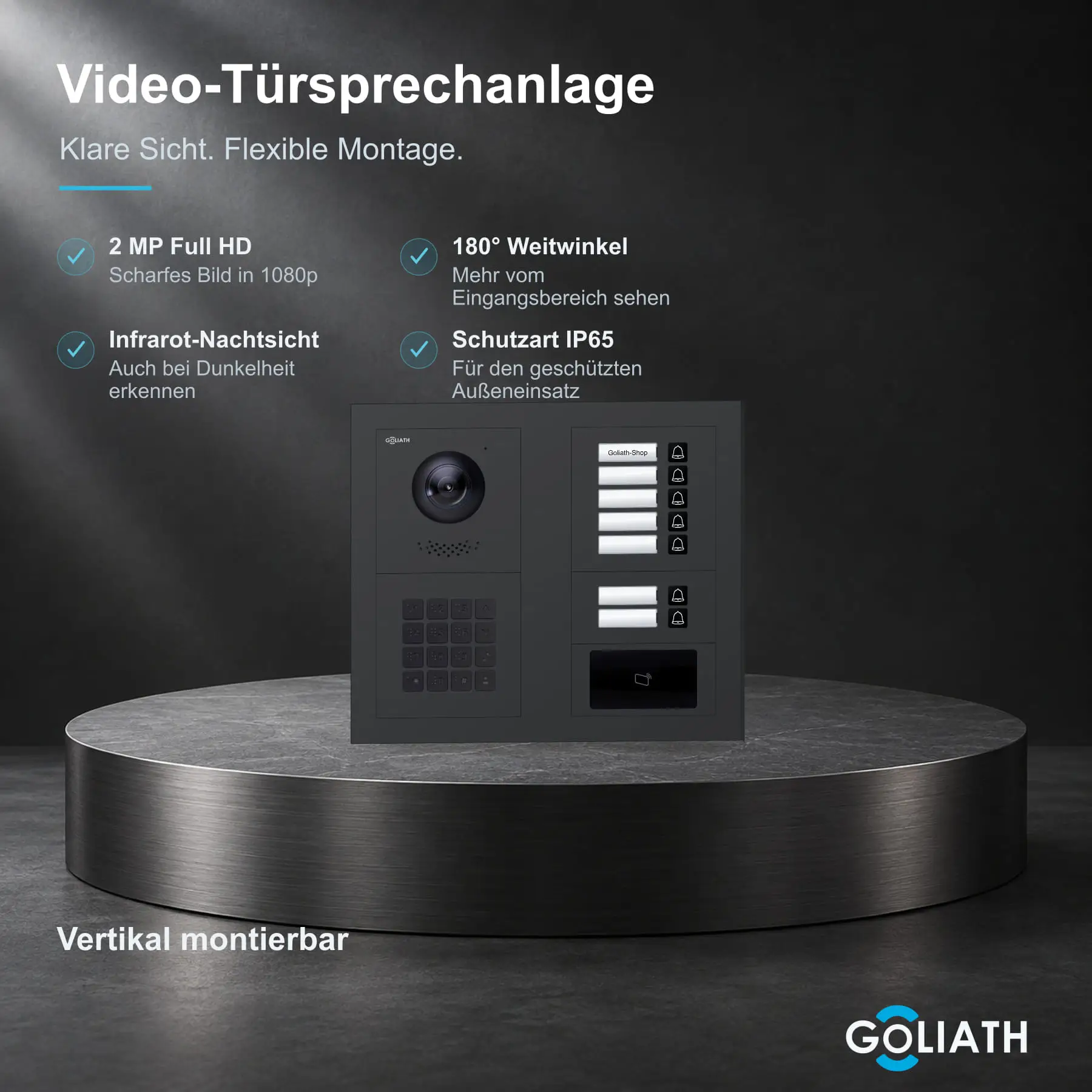 Goliath Premium-Line-Außenstation in Anthrazit mit Kamera, 7 Klingeltasten, Zahlencode-Tastatur und RFID-Leser. Zwei aufrechte Modulspalten nebeneinander auf Naturstein.