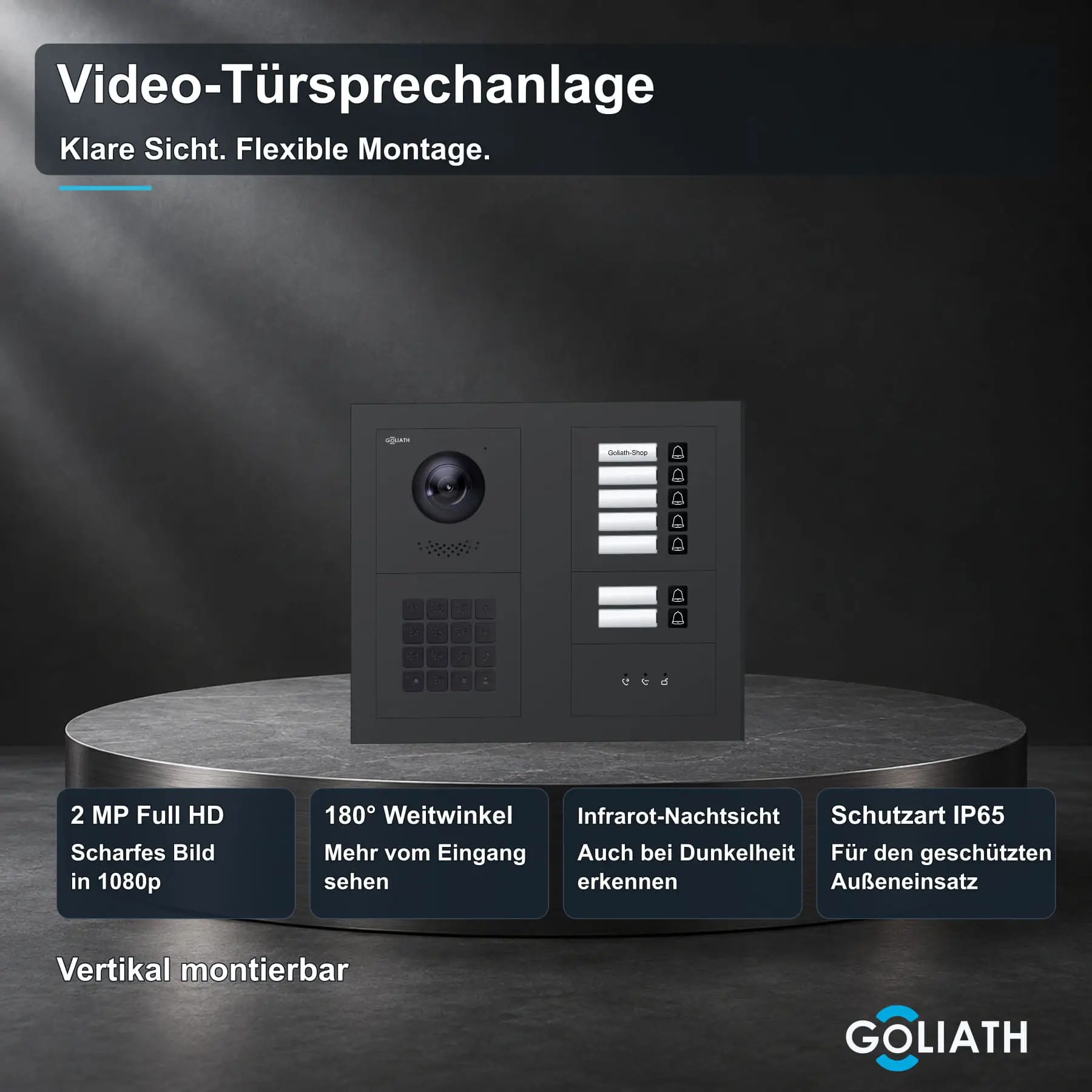 Goliath Premium-Line-Außenstation in Anthrazit mit Kamera, 7 Klingeltasten, Zahlencode-Tastatur und Feedback-Anzeige. Zwei aufrechte Modulspalten nebeneinander auf Naturstein.