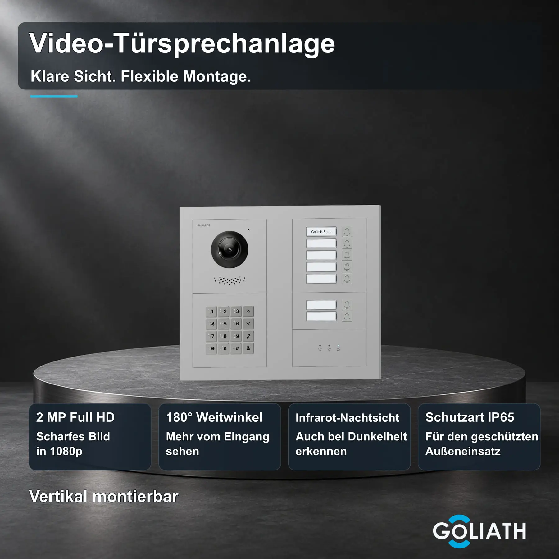 Goliath Premium-Line-Außenstation in Silber mit Kamera, 7 Klingeltasten, Zahlencode-Tastatur und Feedback-Anzeige. Zwei aufrechte Modulspalten nebeneinander auf Naturstein.