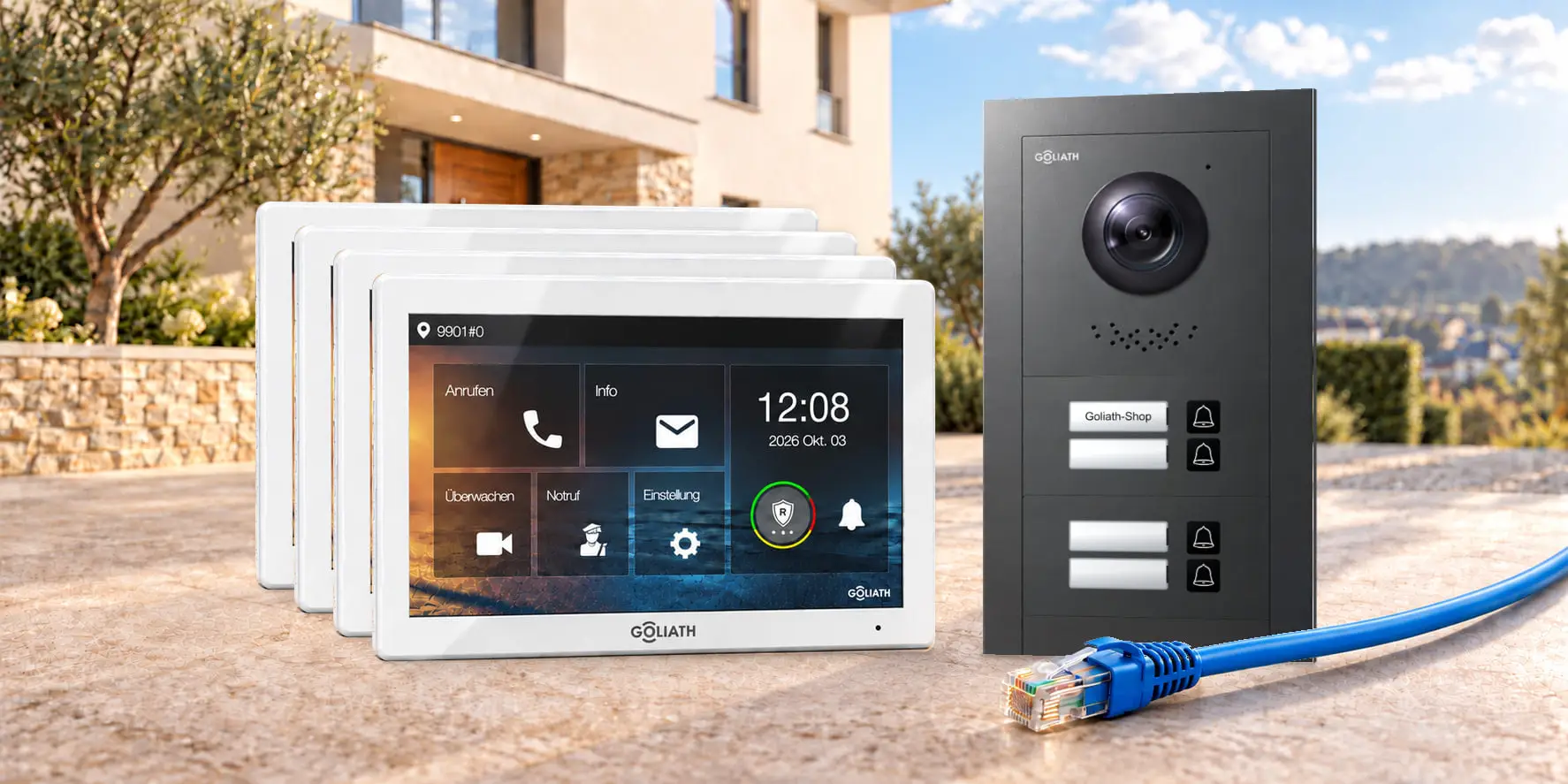 Premium-IP-Set für 4 Familien mit anthrazitfarbener Außenstation und weißen 7-Zoll-Monitoren vor einem Hauseingang